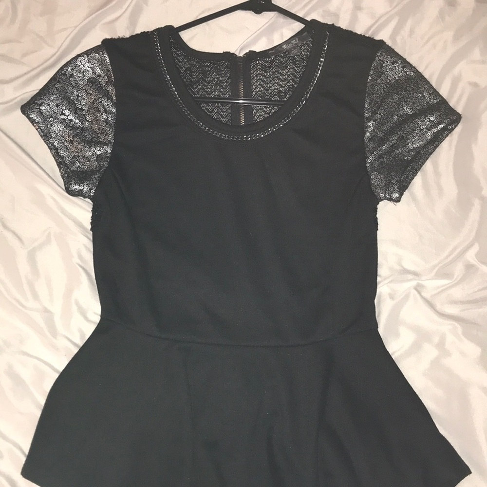 Black peplum miss me top